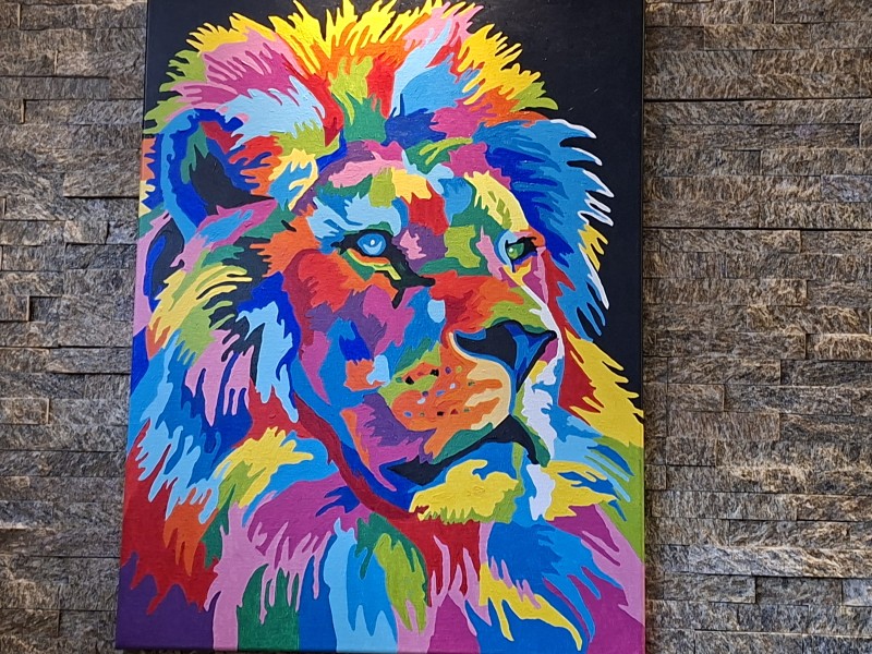 Schilderij van een Leeuw in regenboog kleurene