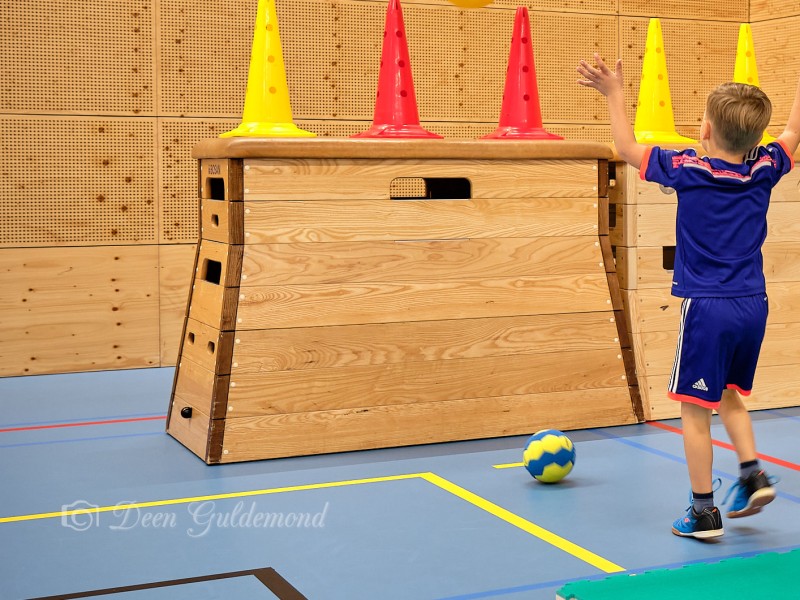 Sportende kinderen in gymzaal