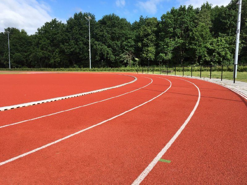 Herstel atletiekbaan Kluunpad